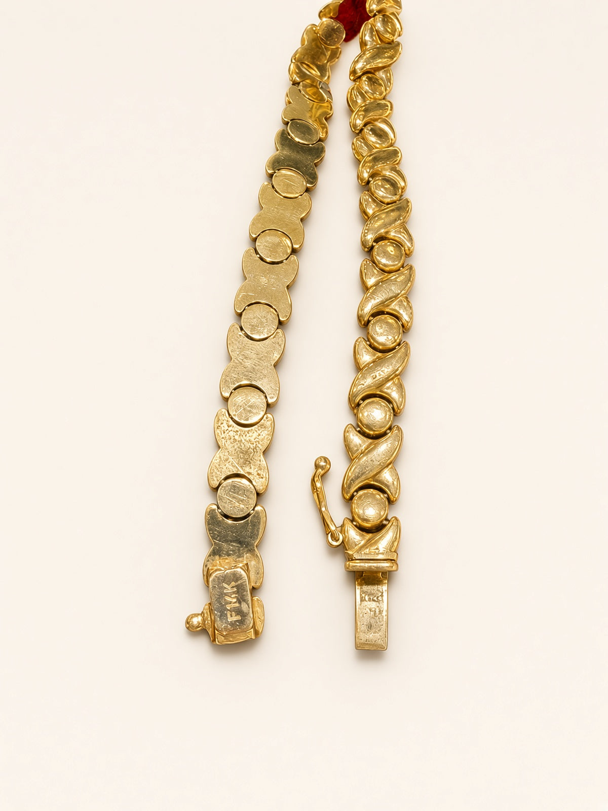 14KT Yellow Gold X&O Bracelet 6.3mm 7" – R193