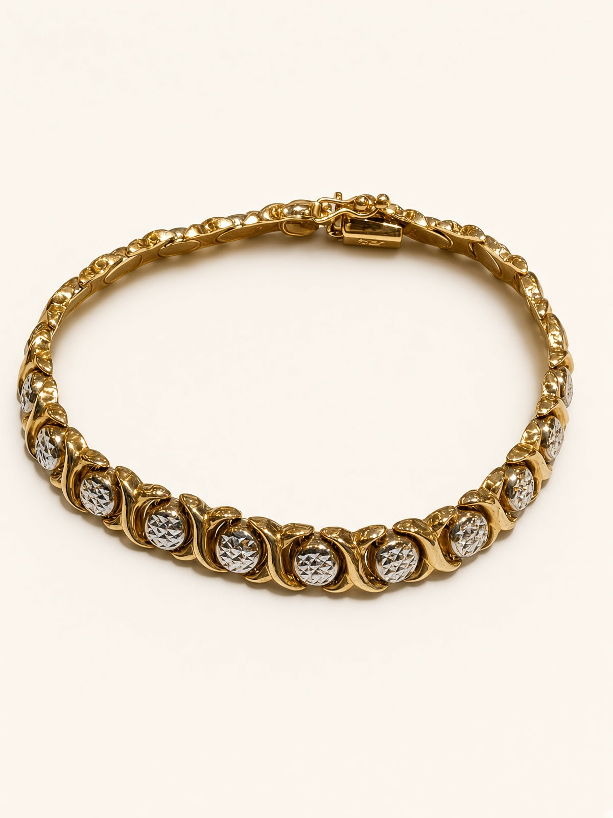 14KT Yellow Gold X&O Diamond-Cut Bracelet 7mm 7" – R217