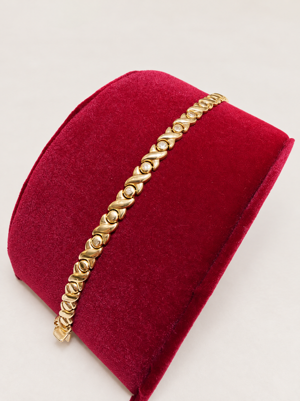 14KT Yellow Gold X&O Bracelet 6.3mm 7" – R193