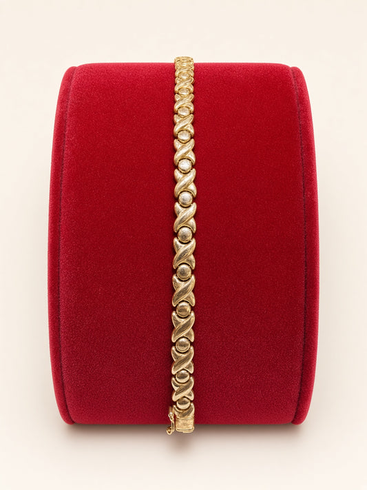 14KT Yellow Gold X&O Bracelet 6.3mm 7" – R193