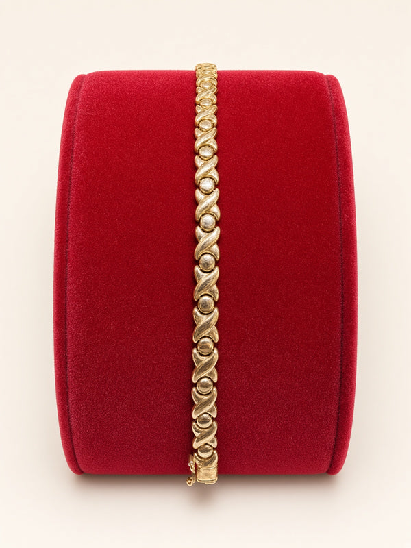 14KT Yellow Gold X&O Bracelet 6.3mm 7" – R193
